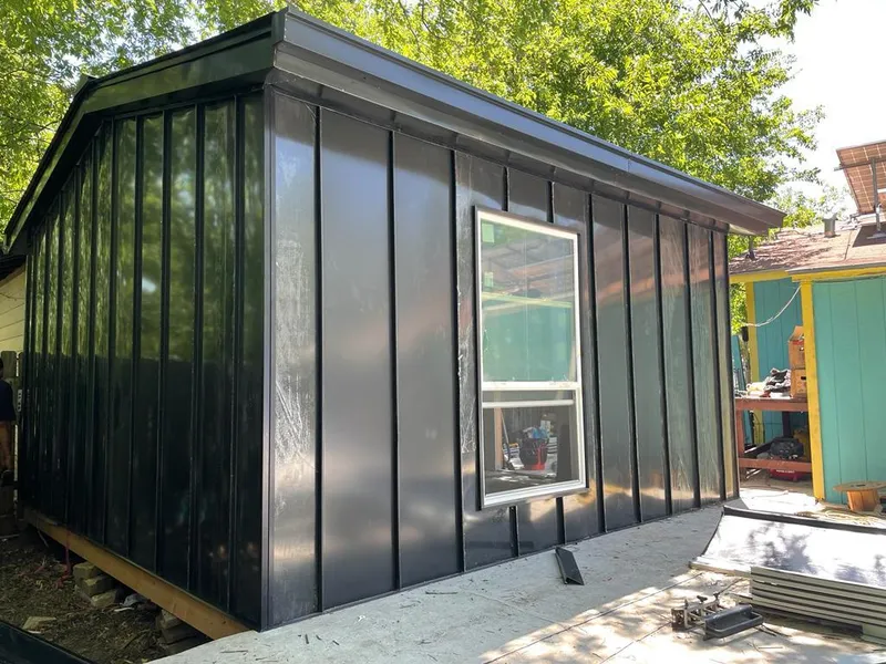 Black standing seam metal wall panels for Roof Inspection in Gun Barrel City